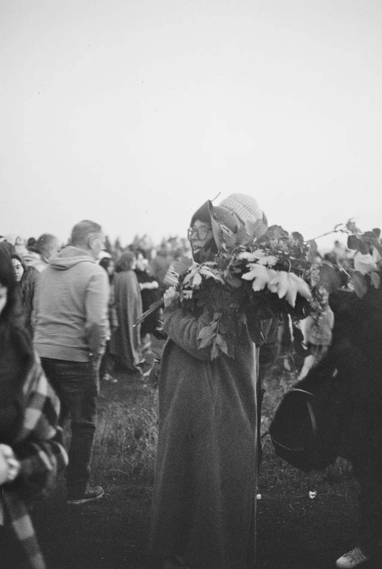 person traditionally dressed with leaves